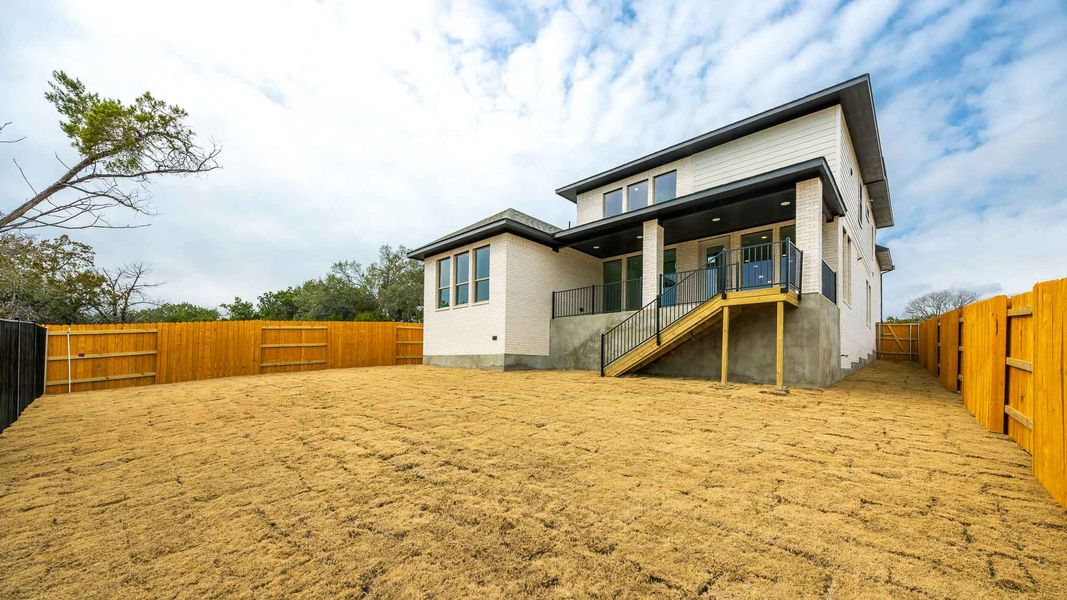 Exterior details and patio area of a home in Parkside On The River, Georgetown (Image 2).