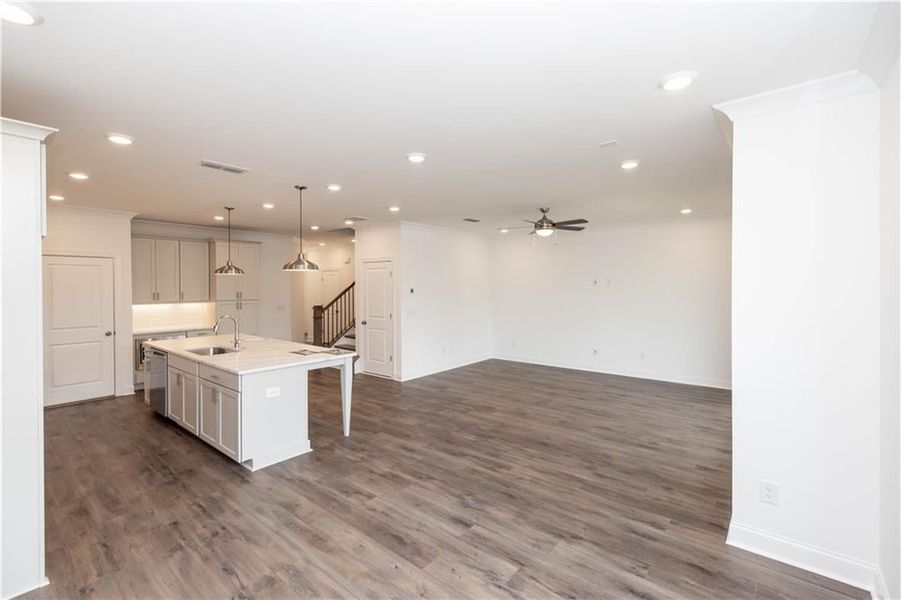 View from Dining Room - crown molding on the first floor and owners suite - More upgraded included with The Providence Group Pictures represent a previously built home, not the actual home.