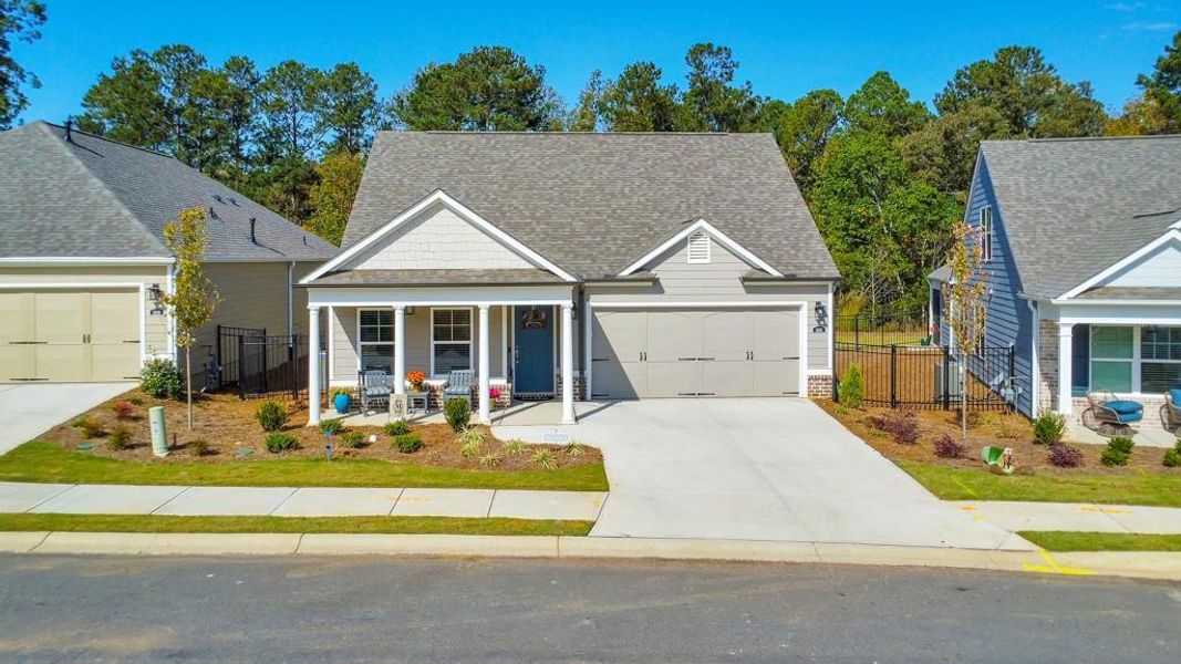 Front exterior of a new home in Madeira, Acworth, GA, highlighting curb appeal (Image 1).