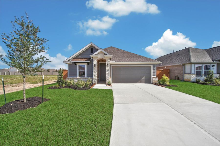 Front exterior of a new home in , Rosharon, TX, highlighting curb appeal (Image 18).