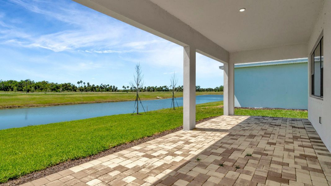 The Backyard of a DRB Homes Grand Hawk which is offered as a home plan at Serengeti in Spring Hill, FL.