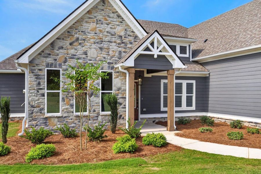 Front exterior of a new home in Veal Meadows, Roopville, GA, highlighting curb appeal (Image 33). Front exterior of a new home in Veal Meadows, Roopville, GA, highlighting curb appeal (Image 33).