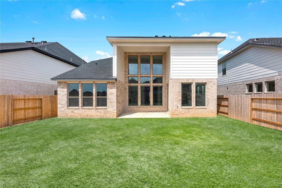 Exterior details and patio area of a home in Sunterra (Katy ISD), Katy (Image 2). Exterior details and patio area of a home in Sunterra (Katy ISD), Katy (Image 2).