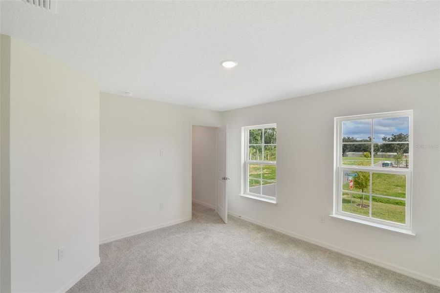 Spacious, unfurnished interior of a new home in Delaney Reserve, Deland (Image 27).