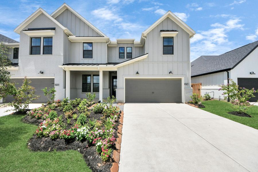 Front exterior of a new home in Bridgeland: Signature Collection, Cypress, TX, highlighting curb appeal (Image 22).