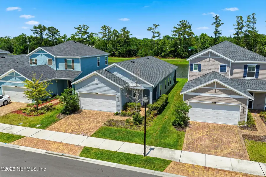 Front exterior of a new home in , Jacksonville, FL, highlighting curb appeal (Image 25).