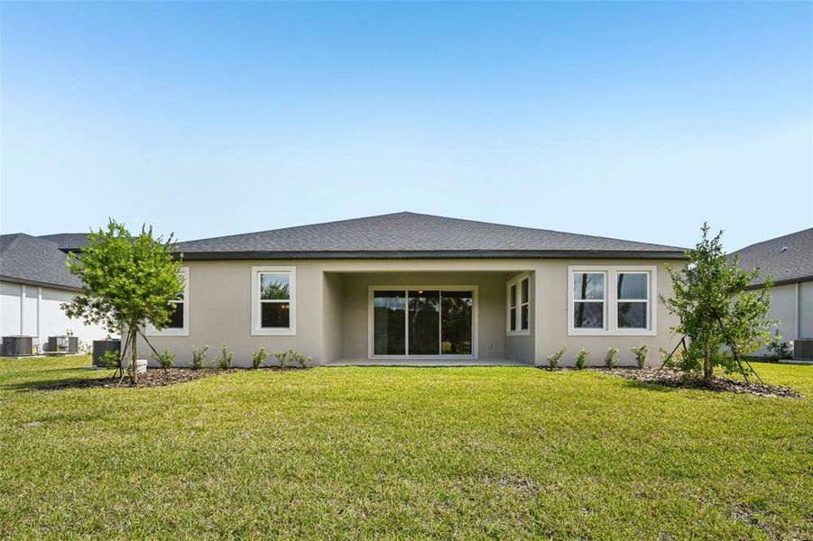 Exterior details and patio area of a home in Ridgehaven - Reserve Series, Ormond Beach (Image 22).