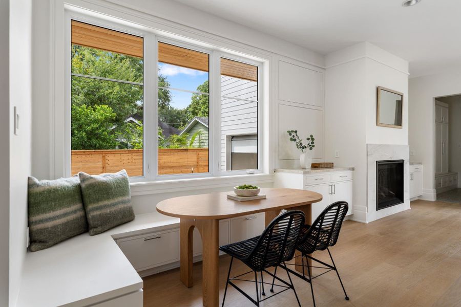 Breakfast room with built-in bench seating with storage.