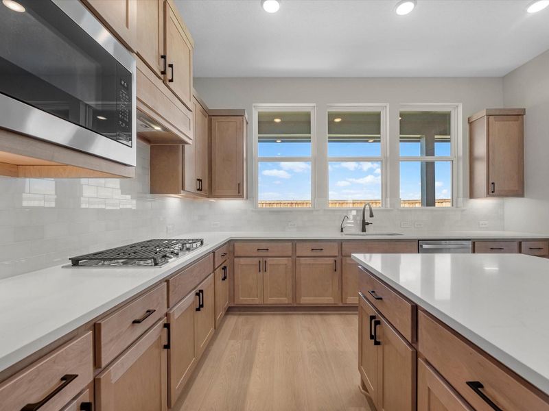 Furnished interior view inside a new home in Dunham Pointe 60′, Cypress (Image 7).
