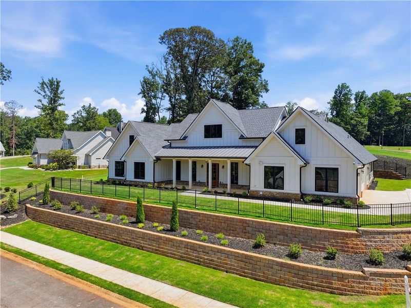 Front exterior of a new home in , Commerce, GA, highlighting curb appeal (Image 2). Front exterior of a new home in , Commerce, GA, highlighting curb appeal (Image 2).