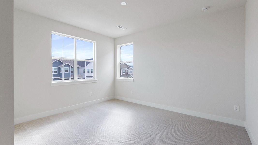 Furnished interior view inside a new home in Dillon Pointe - Journey, Broomfield (Image 24).