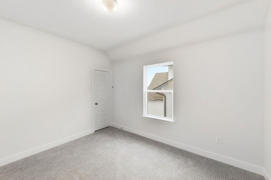 Spacious, unfurnished interior of a new home in The Colony, Bastrop (Image 30).