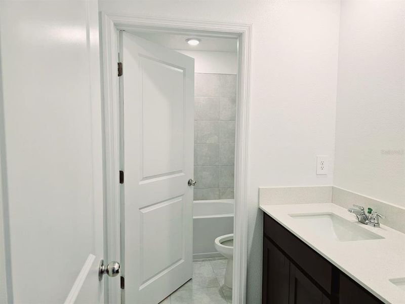 Furnished interior view inside a new home in Peace Creek Reserve, Winter Haven (Image 5).