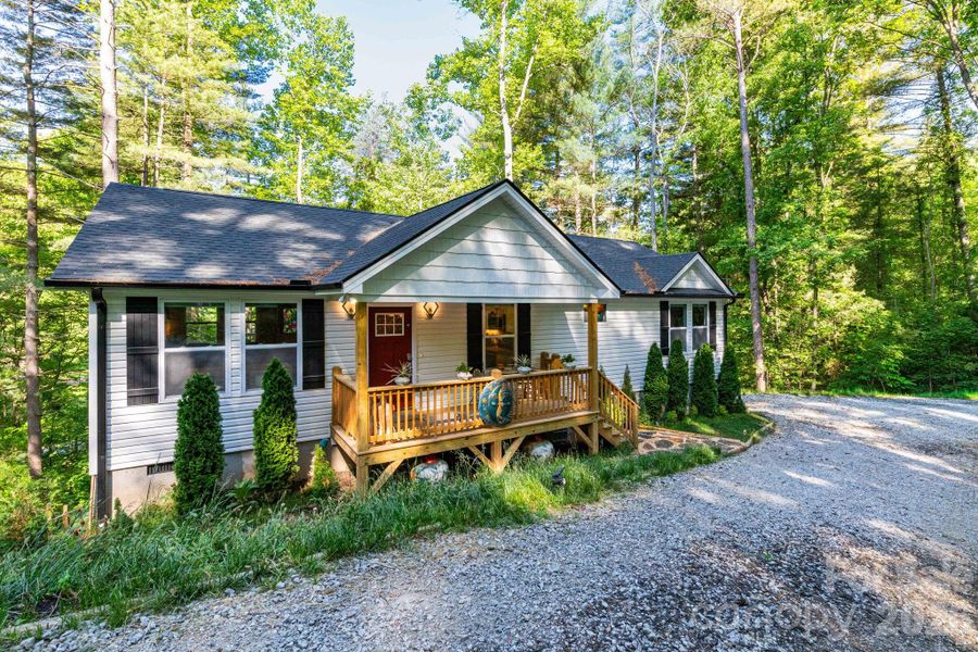 Front of home with covered porch. Front of home with covered porch.