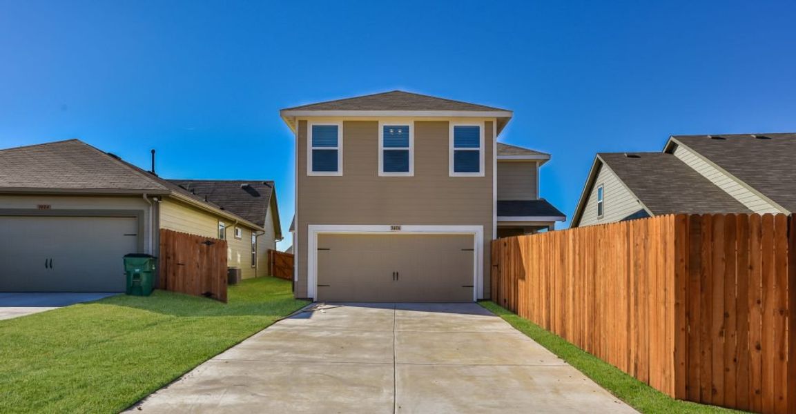 Representative exterior photo of a completed home built from the Adina by Impression Homes in Heartland, Heartland, TX (Image 28). Representative exterior photo of a completed home built from the Adina by Impression Homes in Heartland, Heartland, TX (Image 28).