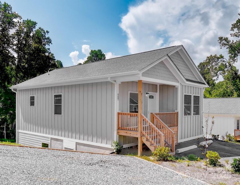 Front exterior of a new home in , Asheville, NC, highlighting curb appeal (Image 1).
