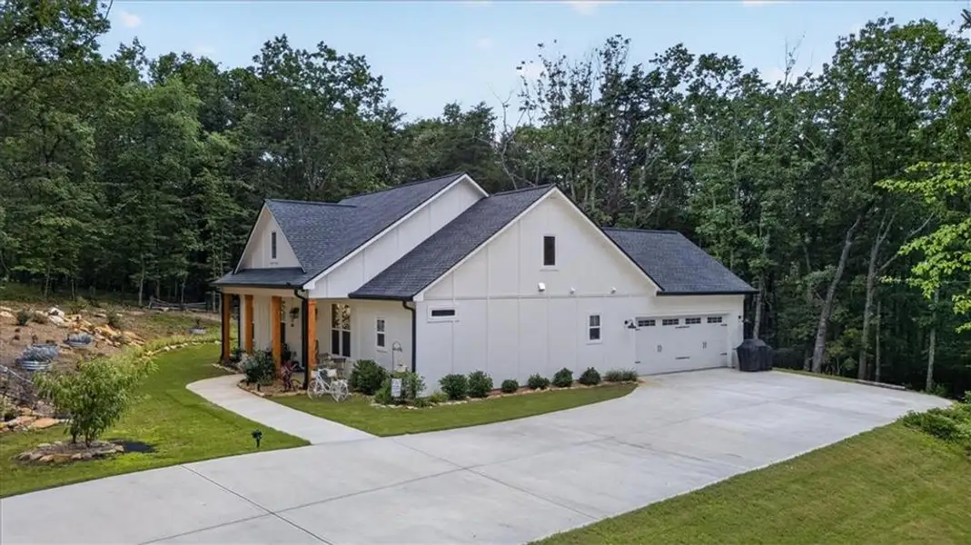 Front exterior of a new home in , Jasper, GA, highlighting curb appeal (Image 1). Front exterior of a new home in , Jasper, GA, highlighting curb appeal (Image 1).
