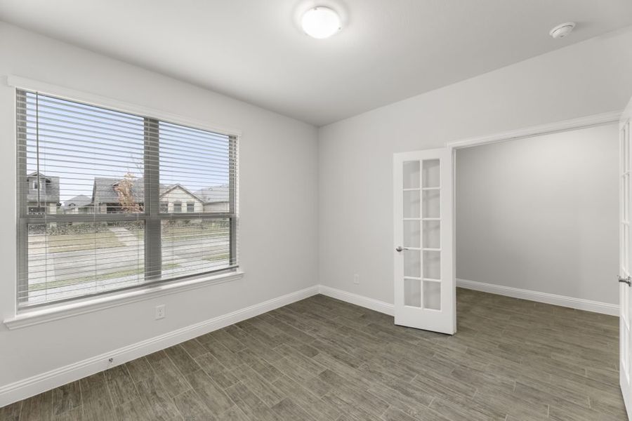 Front exterior of a new home in Redden Farms – Active Adult, Midlothian, TX, highlighting curb appeal (Image 12).