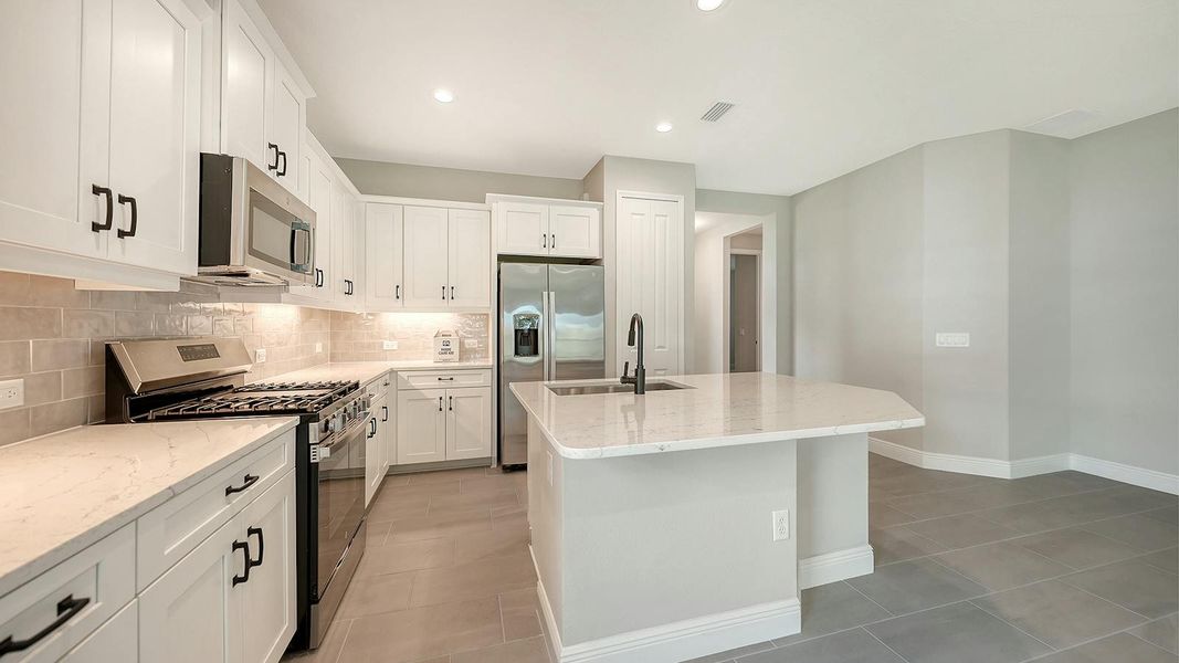 Furnished interior view inside a new home in Wildleaf Real Estate and Homes for Sale in Parrish, FL - Neal Communities, Parrish (Image 10).