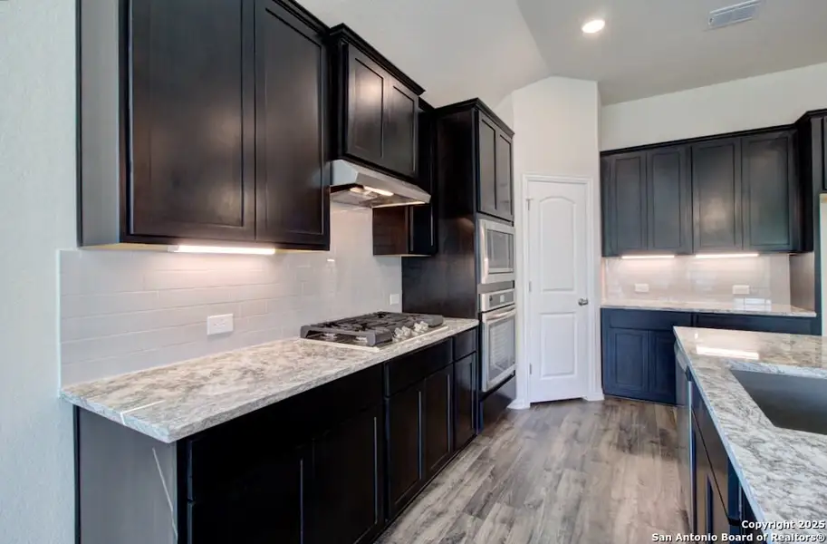 Furnished interior view inside a new home in Veranda, San Antonio (Image 5).