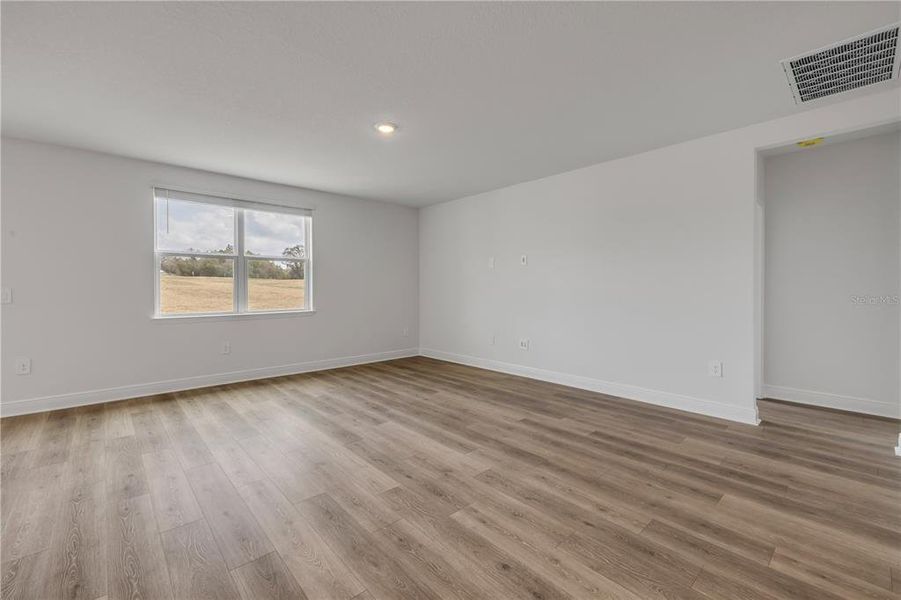 Spacious, unfurnished interior of a new home in , Lady Lake (Image 36).