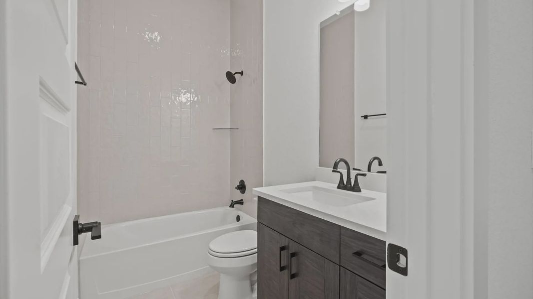 Furnished interior view inside a new home in 6 Creeks, Kyle (Image 11).