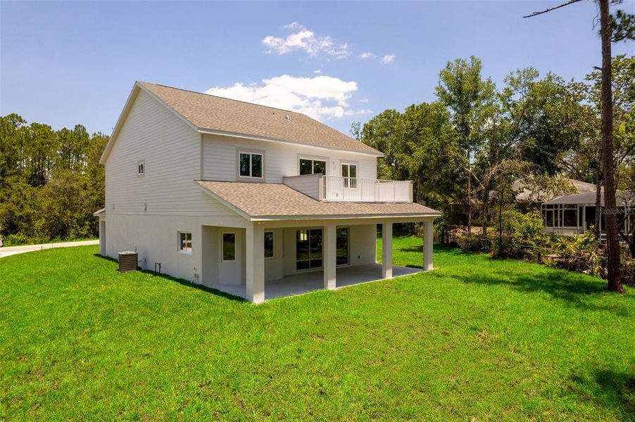 Front exterior of a new home in , Deltona, FL, highlighting curb appeal (Image 24).