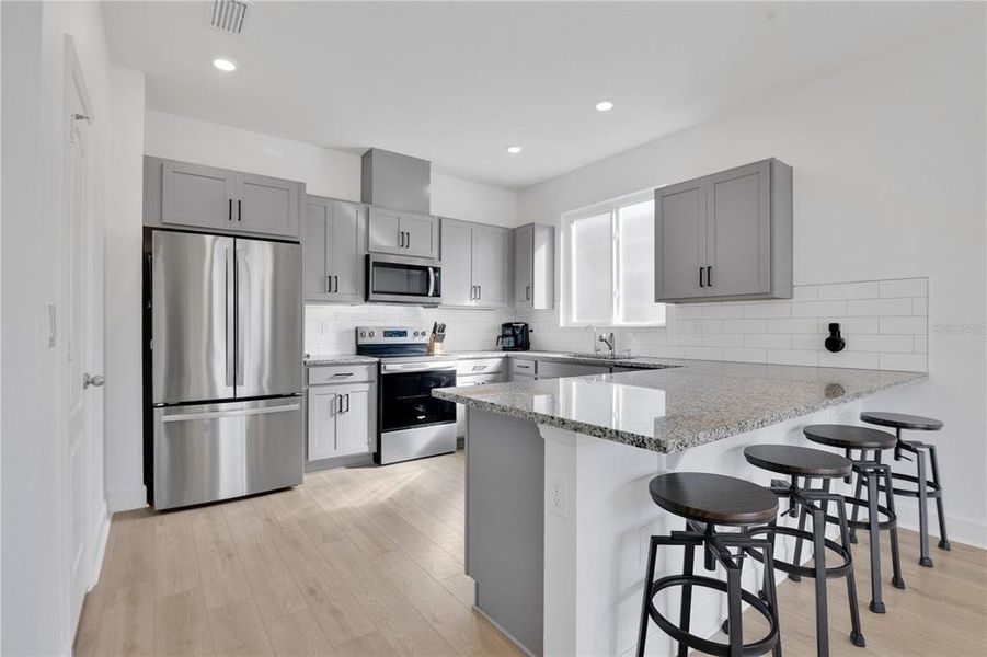 Furnished interior view inside a new home in , Clermont (Image 5).