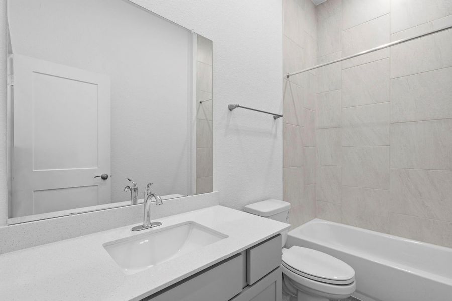 Furnished interior view inside a new home in Wildrye 45', Waller (Image 11).