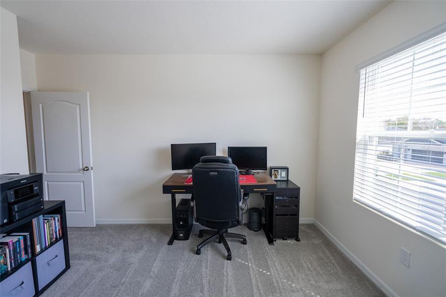 Furnished interior view inside a new home in Harmony at Lake Eloise, Winter Haven (Image 31).