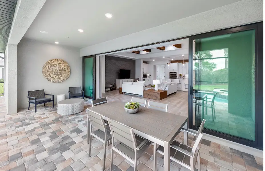 Exterior details and patio area of a home in Avondale at Avenir, Palm Beach Gardens (Image 22).