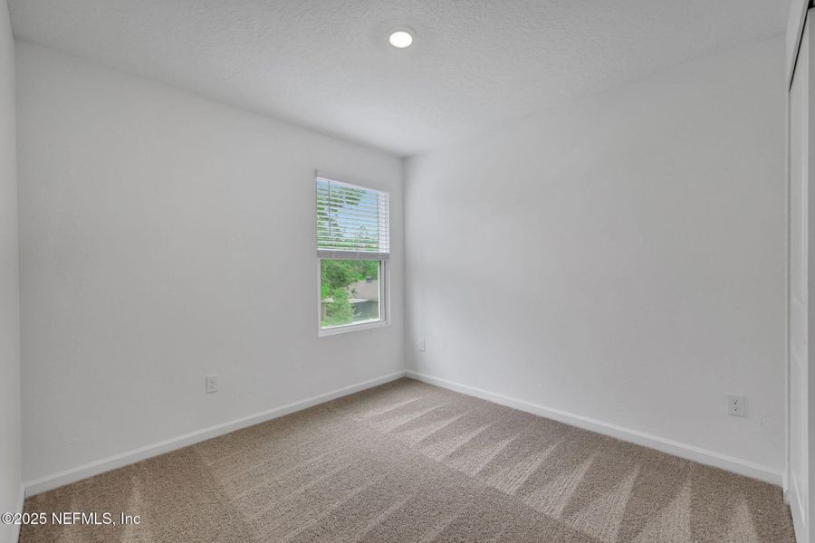 Spacious, unfurnished interior of a new home in Kasen Oaks, Jacksonville (Image 27).