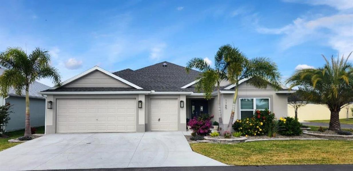 Front exterior of a new home in , The Villages, FL, highlighting curb appeal (Image 1). Front exterior of a new home in , The Villages, FL, highlighting curb appeal (Image 1).
