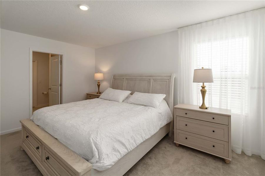 Furnished interior view inside a new home in Peace Creek Reserve: Manor Key Collection, Winter Haven (Image 19).
