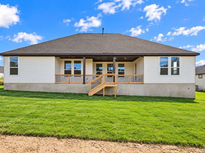 Exterior details and patio area of a home in Potranco Oaks, Castroville (Image 4).