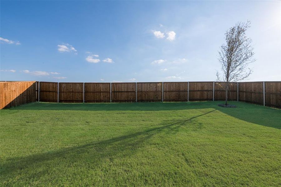 Exterior details and patio area of a home in Arbors at Legacy Hills, Celina (Image 19). Exterior details and patio area of a home in Arbors at Legacy Hills, Celina (Image 19).