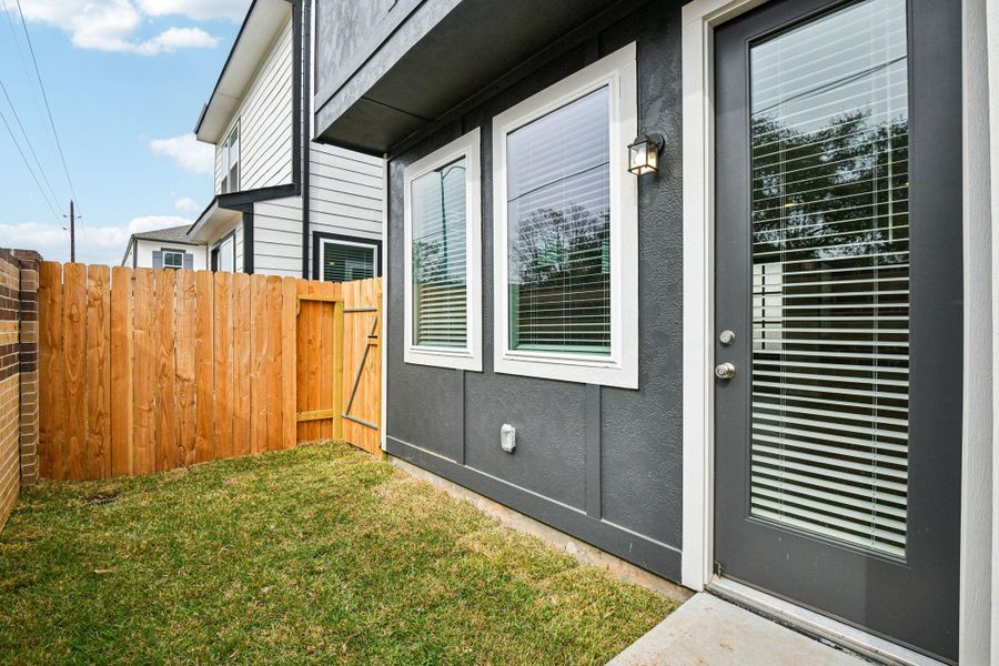 Exterior details and patio area of a home in Spring Brook Village - City Series, Houston (Image 28).