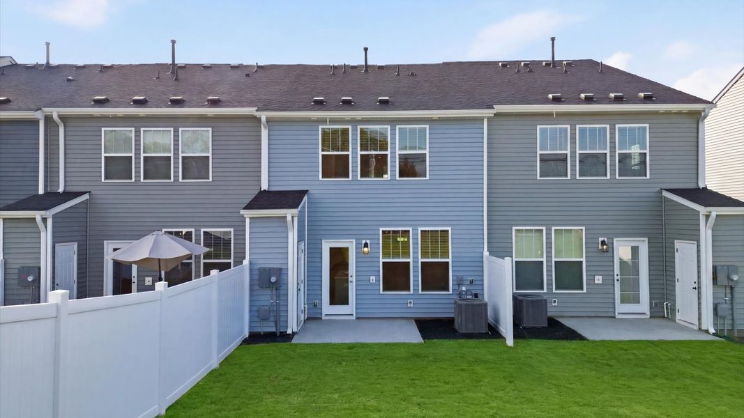 Highly functional rear patio adds memorable living space to this elegant home located in Anderson, SC