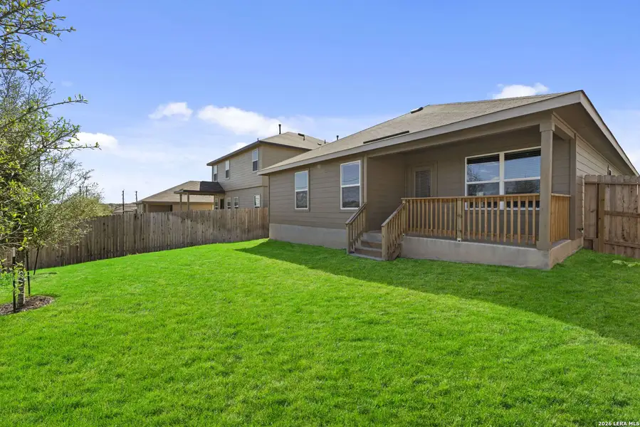 Exterior details and patio area of a home in Redbird Ranch, San Antonio (Image 2).