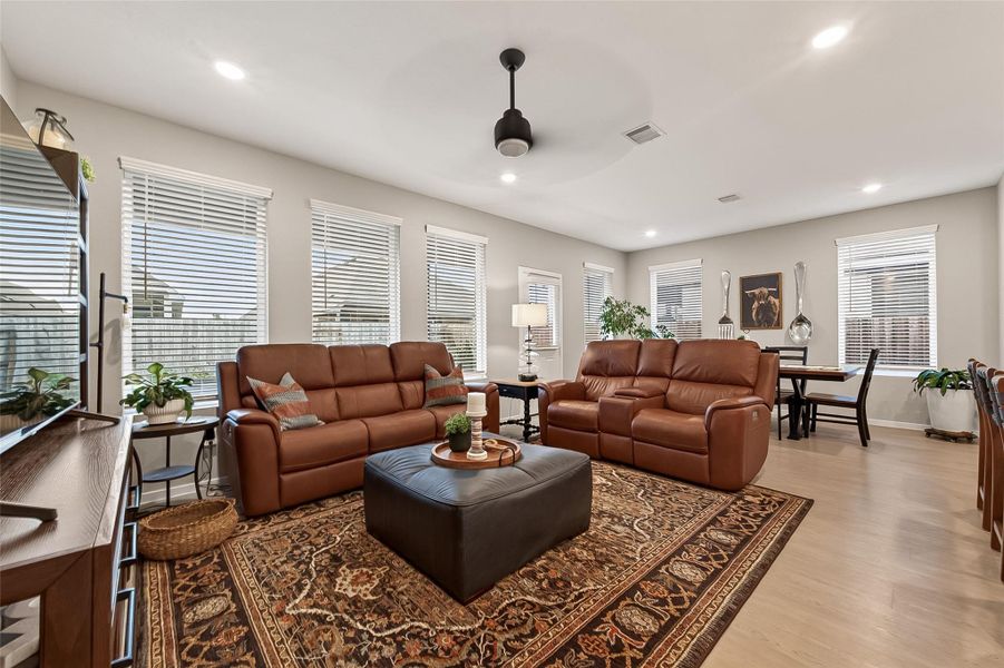 Spacious family room with abundant natural light and open-concept layout. Spacious family room with abundant natural light and open-concept layout.