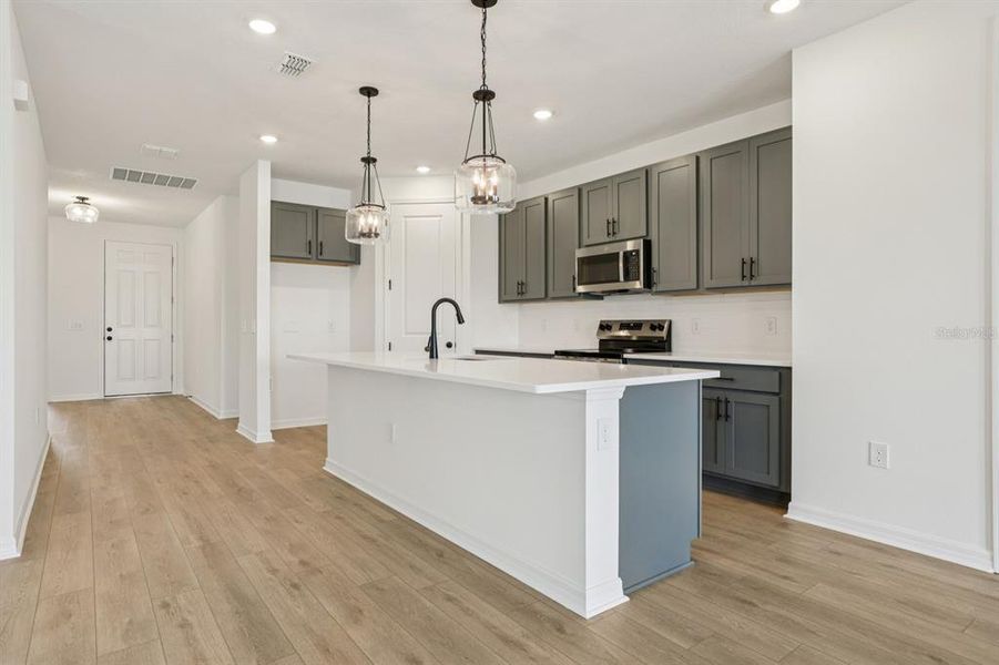 Furnished interior view inside a new home in Ellington Traditional, St. Cloud (Image 9). Furnished interior view inside a new home in Ellington Traditional, St. Cloud (Image 9).