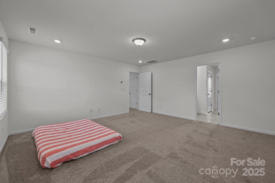 Spacious, unfurnished interior of a new home in Piper Landing, Concord (Image 35).