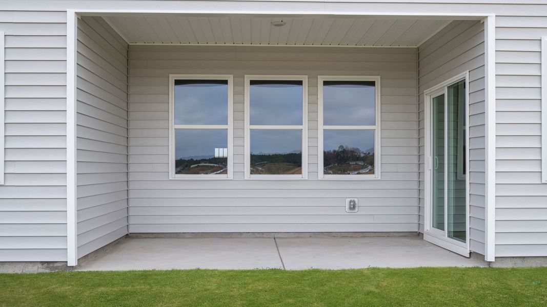 Exterior details and patio area of a home in East Ridge, Ayden (Image 19).