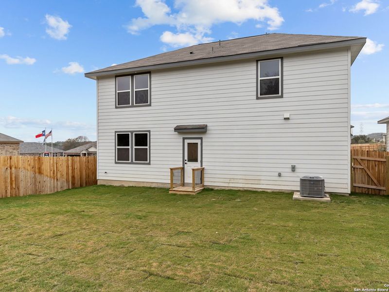 Exterior details and patio area of a home in Royal Crest, San Antonio (Image 4).