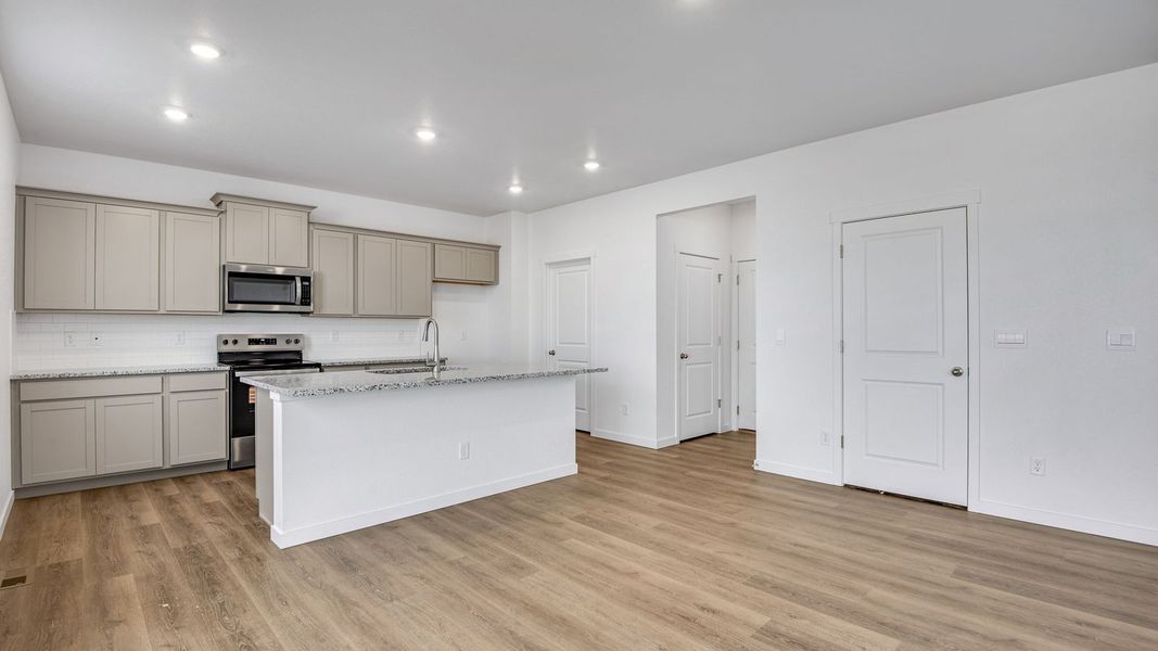 Furnished interior view inside a new home in Silver Peaks, Lochbuie (Image 4).