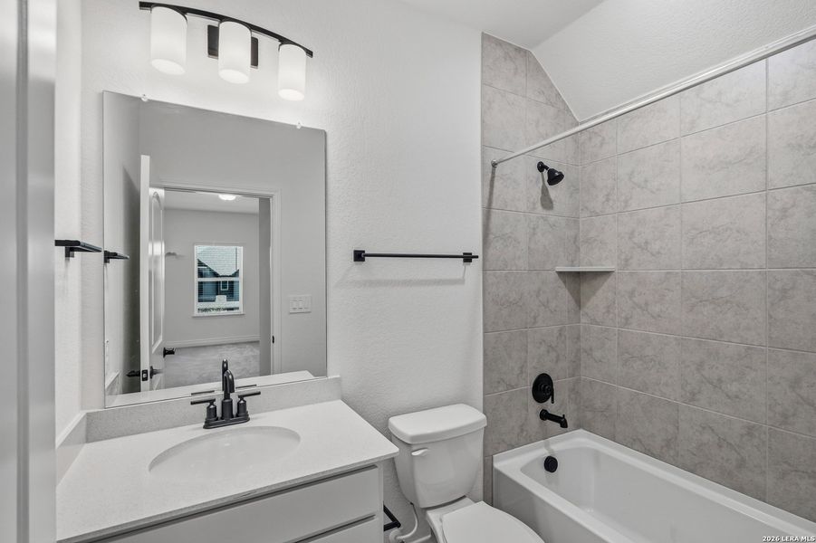 Furnished interior view inside a new home in Bison Ridge, San Antonio (Image 14).