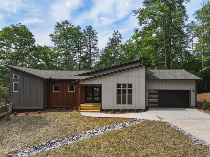 Front exterior of a new home in , Ellijay, GA, highlighting curb appeal (Image 1). Front exterior of a new home in , Ellijay, GA, highlighting curb appeal (Image 1).