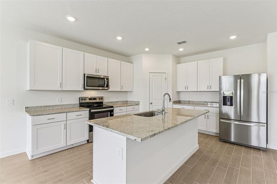 Furnished interior view inside a new home in Colbert Landings, Palm Coast (Image 6).