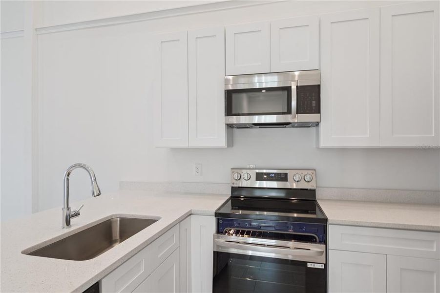 Furnished interior view inside a new home in , Kissimmee (Image 7).