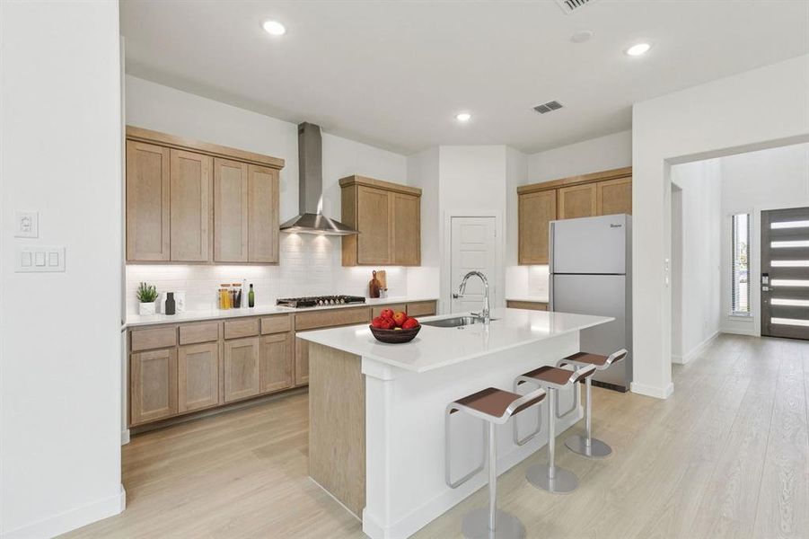 Kitchen in the Da Vinci II home plan by Trophy Signature Homes – REPRESENTATIVE PHOTO